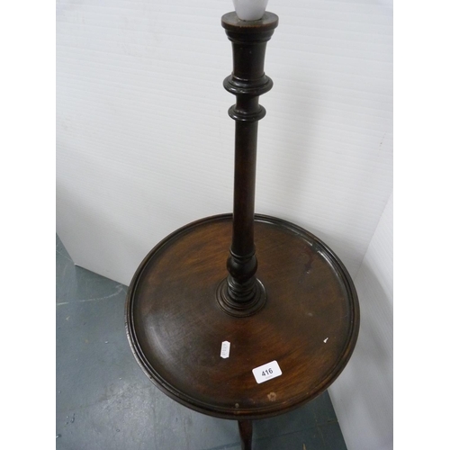 416 - Mahogany standard lamp table.