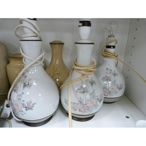 42 - Assorted table lamps, claret jugs, jar etc.