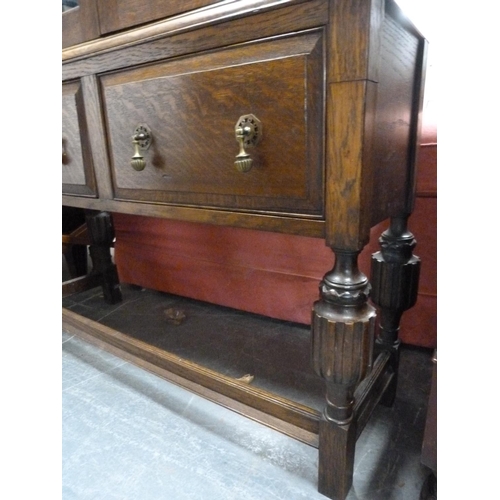 421 - Oak two-door bookcase cabinet.