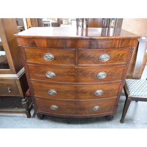 422 - Mahogany bowfront chest of two short and three long drawers.