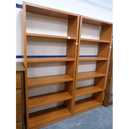 427 - Two open bookcases.