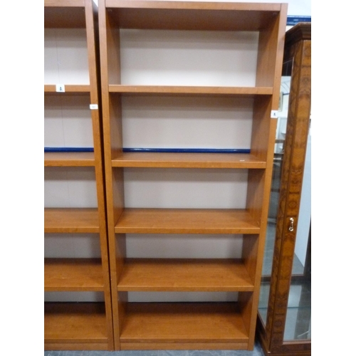 427 - Two open bookcases.