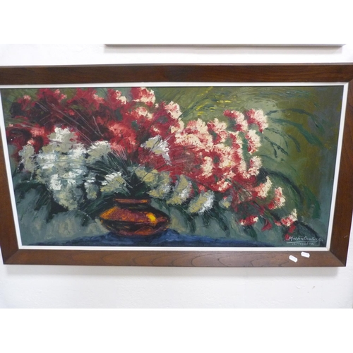 48 - Oak frame, still life of red flowers.