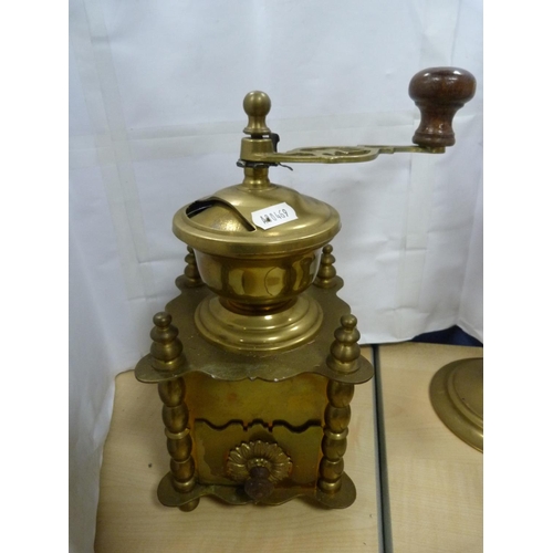 5 - Brass spice grinder, pair of candlesticks and a tankard.