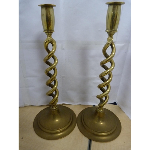 5 - Brass spice grinder, pair of candlesticks and a tankard.