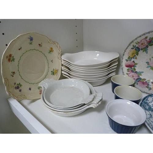 57 - Assorted kitchenware and ceramics including tureens and plates.