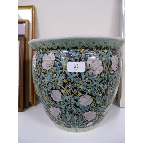 63 - Oriental planter with floral decoration.