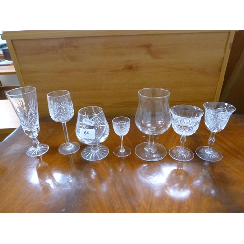 64 - Assorted glassware including flutes, goblets, brandy glasses etc.