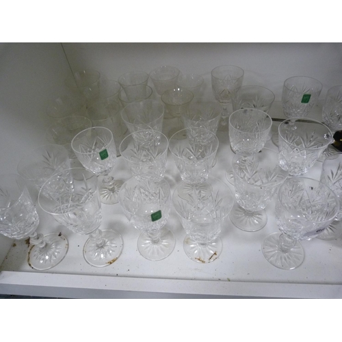 66 - Assorted glassware including Edinburgh Crystal wine glasses, mirror, lamp etc.