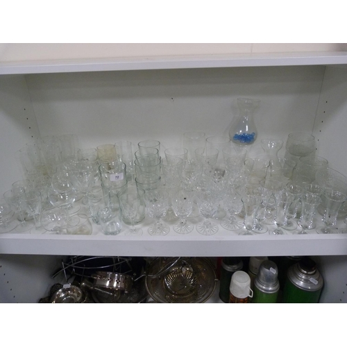 72 - Large quantity of glasses including wine, shot, and vases.