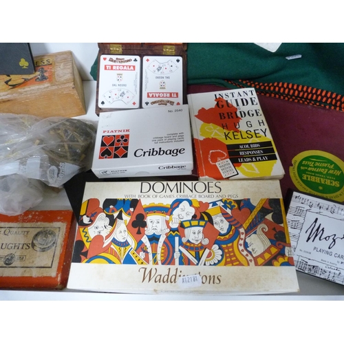 75 - Vintage games, playing cards, chess pieces, draughts etc.