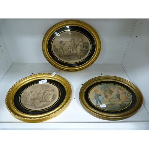 82 - Three oval framed mezzotints depicting children playing.