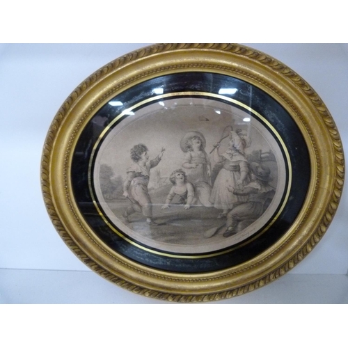 82 - Three oval framed mezzotints depicting children playing.