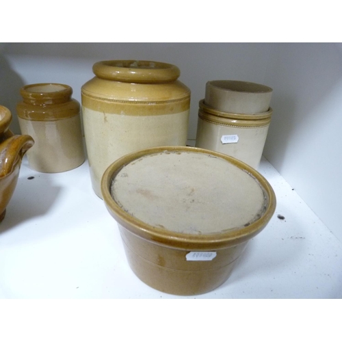 87 - Assorted earthenware jars.