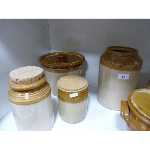 87 - Assorted earthenware jars.