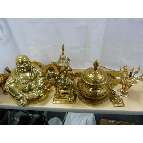 94 - Assorted brassware including Buddha, kettle, oversized key, Irish Guards belt buckle etc.