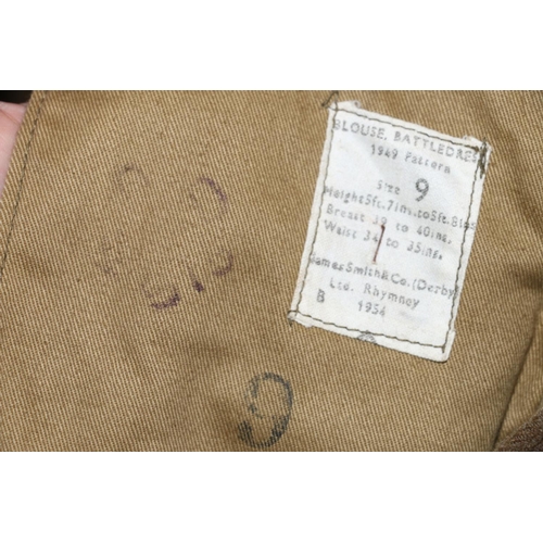 1135 - British Army uniform, a British Army khaki green battledress jacket with James Smith and Co (Derby) ... 