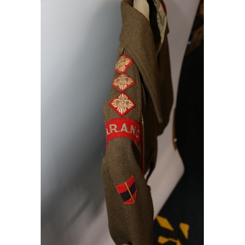 1136 - British Army uniform, a British Army khaki green battledress jacket with F W Harmer and Co Ltd label... 