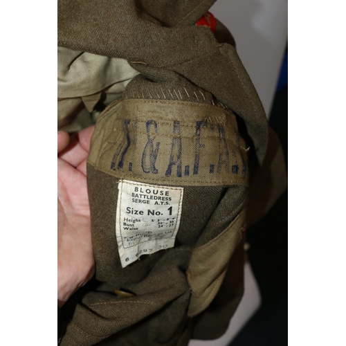 1136 - British Army uniform, a British Army khaki green battledress jacket with F W Harmer and Co Ltd label... 