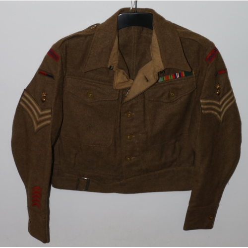 1145 - British Army uniform, a British Army khaki green battledress jacket with Askett Limited label 