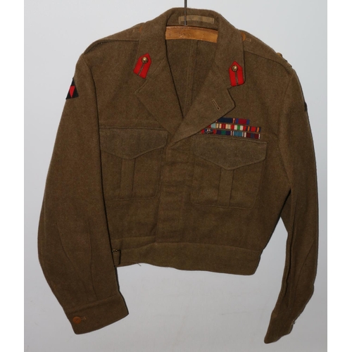 1148 - British Army uniform, a British Army khaki green battledress jacket with B Bloom Ltd label 