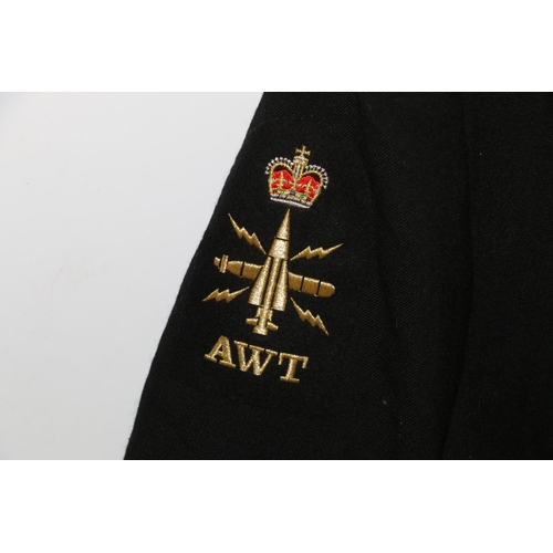 1152 - British Naval uniform, a Royal Navy black jacket with TKS staybrite anchor buttons, bullion wire AWT... 