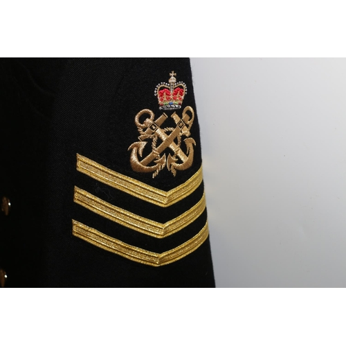 1152 - British Naval uniform, a Royal Navy black jacket with TKS staybrite anchor buttons, bullion wire AWT... 