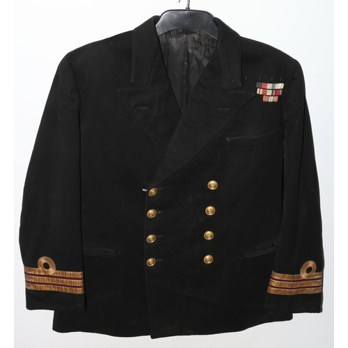 1154 - British Naval uniform, a Roya Navy black jacket having Gieves Ltd brass anchor buttons, lower sleeve... 