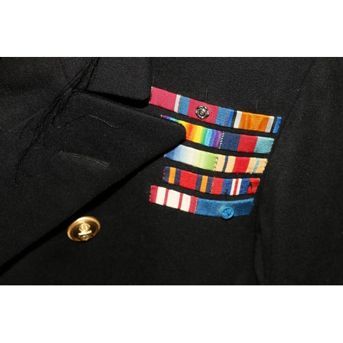 1155 - British Naval uniform, a Royal Navy greatcoat with Gieves Ltd label 