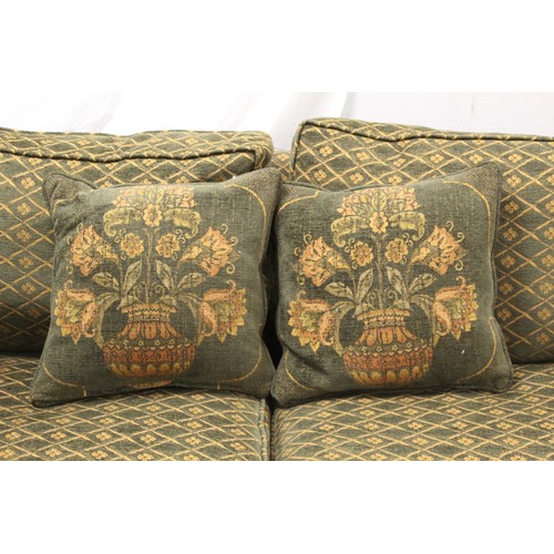 573 - Peter Guild three seater Knole sofa upholstered in green and gold boucle moquette, with four scatter... 