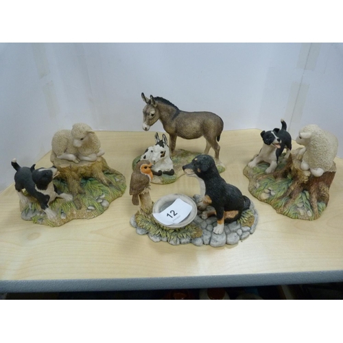 12 - Four Border Fine Arts models to include puppy and robin, two sheep, Jenny and Penny.