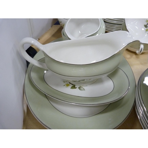 13 - Green and floral pattern dinner service.