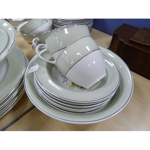 13 - Green and floral pattern dinner service.