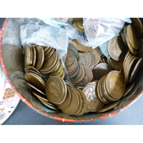 291 - Two tins of world coins including British pennies and 3d.