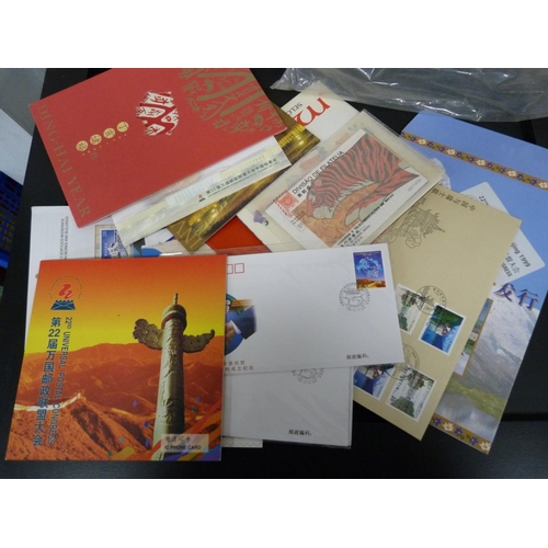 293 - Bag containing Chinese postage stamps including a folder of Ding-Chai stamps.