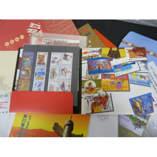 293 - Bag containing Chinese postage stamps including a folder of Ding-Chai stamps.