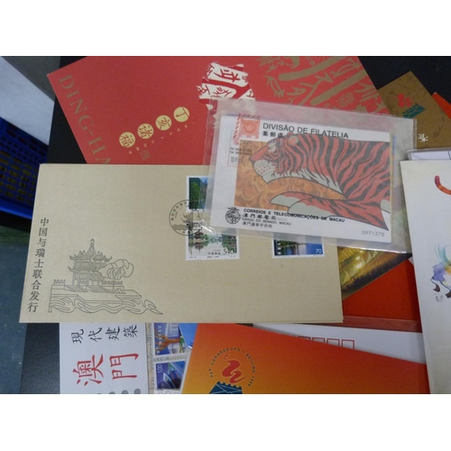 293 - Bag containing Chinese postage stamps including a folder of Ding-Chai stamps.