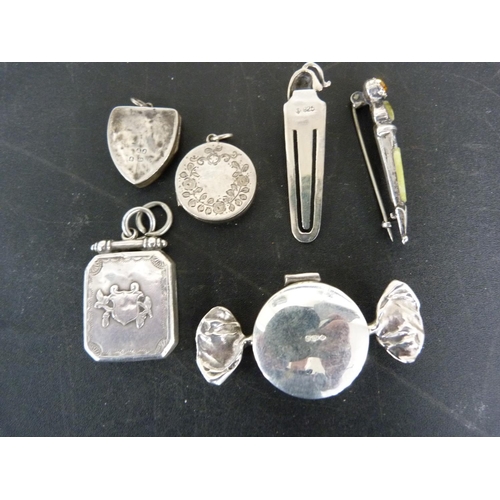 300 - Silver trinket box in the shape of a sweet, Scottish citrine pebble brooch and three silver lockets ... 