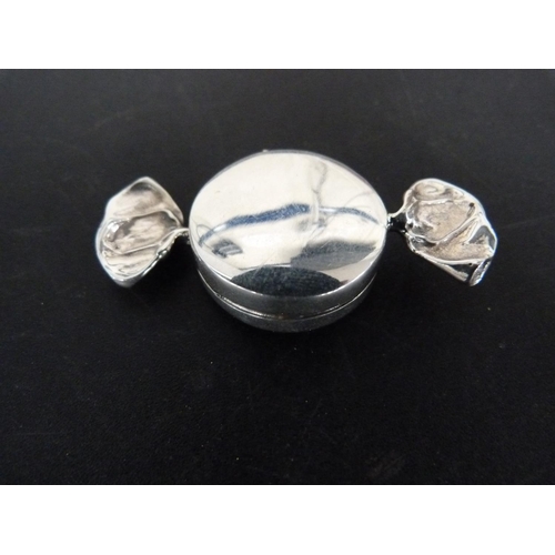 300 - Silver trinket box in the shape of a sweet, Scottish citrine pebble brooch and three silver lockets ... 