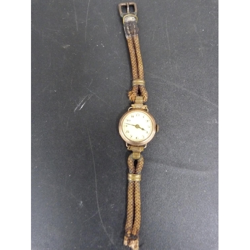 306 - Vintage lady's 9ct Swan wristwatch, dated 1937.