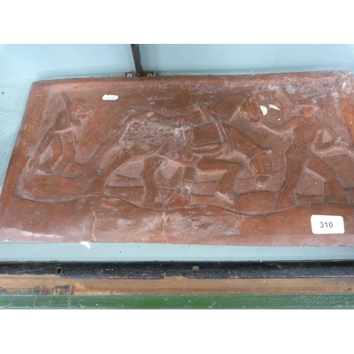 310 - Rectangular pottery plaque depicting ploughing.