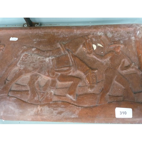 310 - Rectangular pottery plaque depicting ploughing.