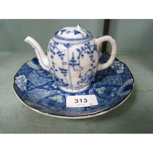 313 - Antique blue and white porcelain teapot, indistinctly marked to the base, with later Japanese dish.&... 