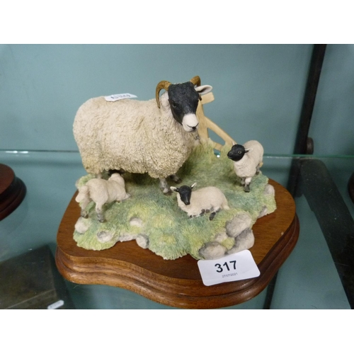 317 - Border Fine Arts figure of a sheep with three lambs.