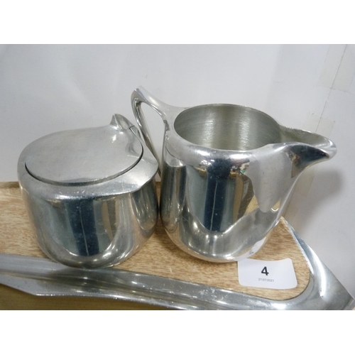 4 - Four-piece Picquot ware tea set on tray.