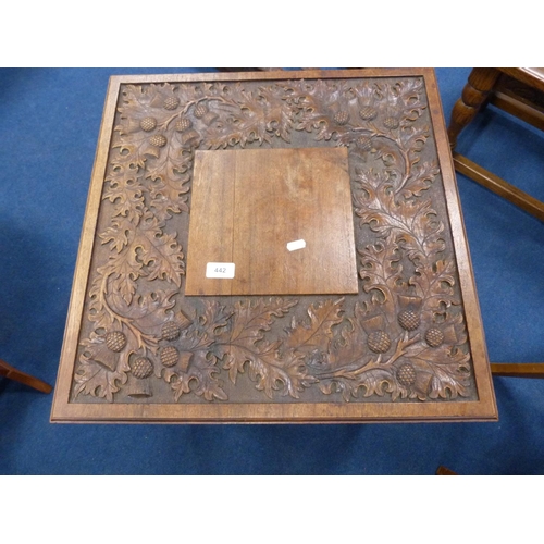 442 - Carved oak two-tier table depicting thistles.