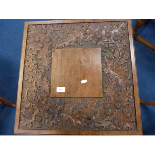 442 - Carved oak two-tier table depicting thistles.