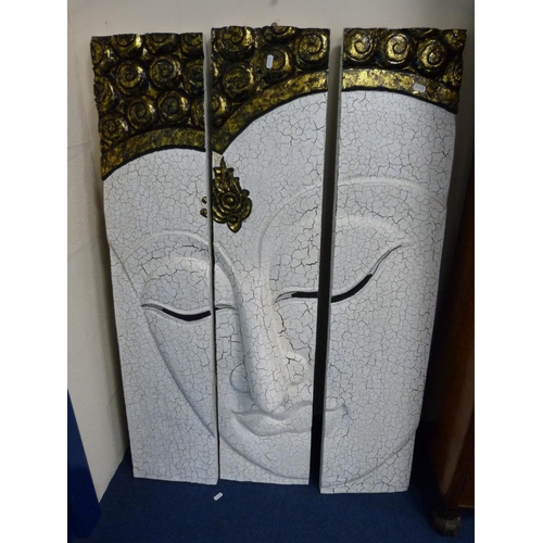 444 - Three wall panels depicting a face.