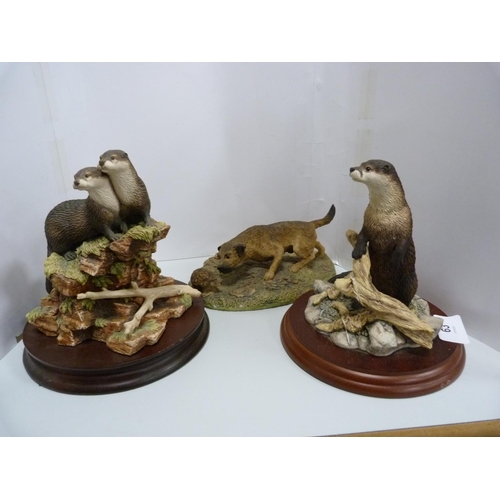 63 - Three Border Fine Arts models, 'Scenting the Air', 'The Terrier', and two otters.