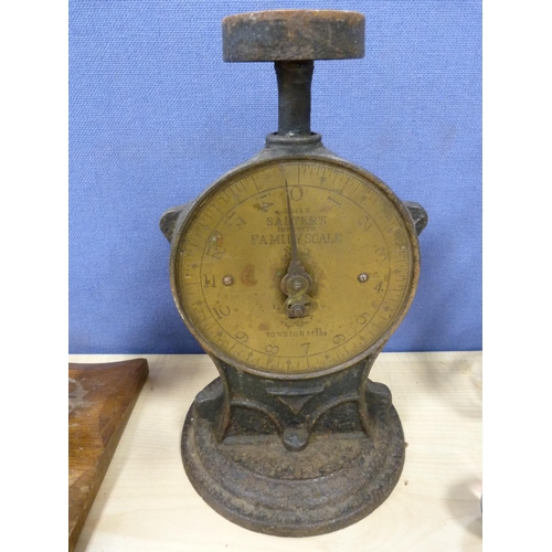 7 - Brass model of a blacksmith, set of Salter scales and a griddle.